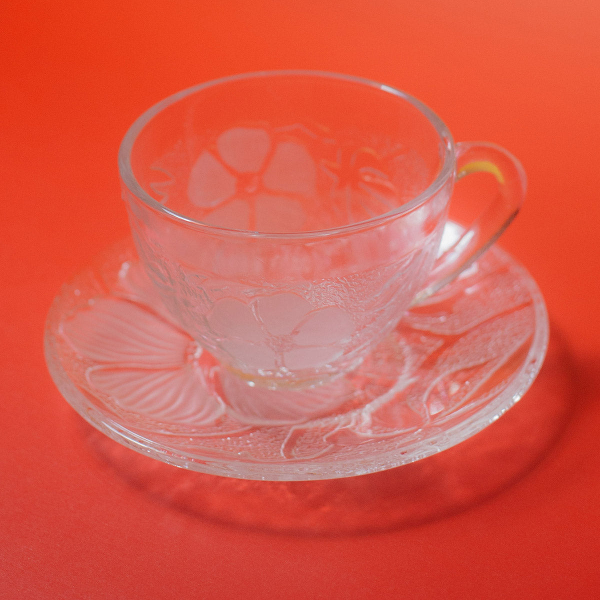 Arcoroc pink glass tea cups and saucers